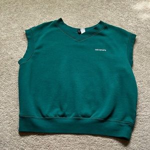 dark green des sports vest